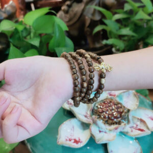 Chuỗi trầm hương 4 vòng mix charm Kim Cang
